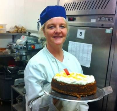b2ap3_thumbnail_trina-with-cake_20130418-144104_1.JPG