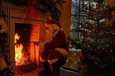father-christmas-in-front-of-the-fire_small-third