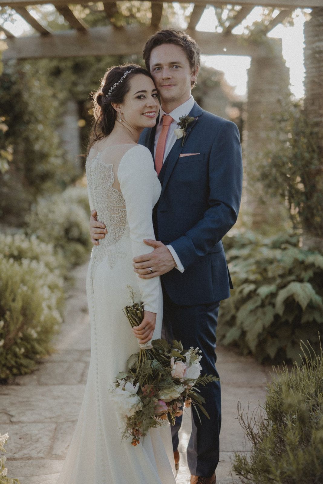 Be inspired by this couple's rustic Hestercombe real wedding, with an Orangery ceremony, rustic barn style reception and English garden flowers...