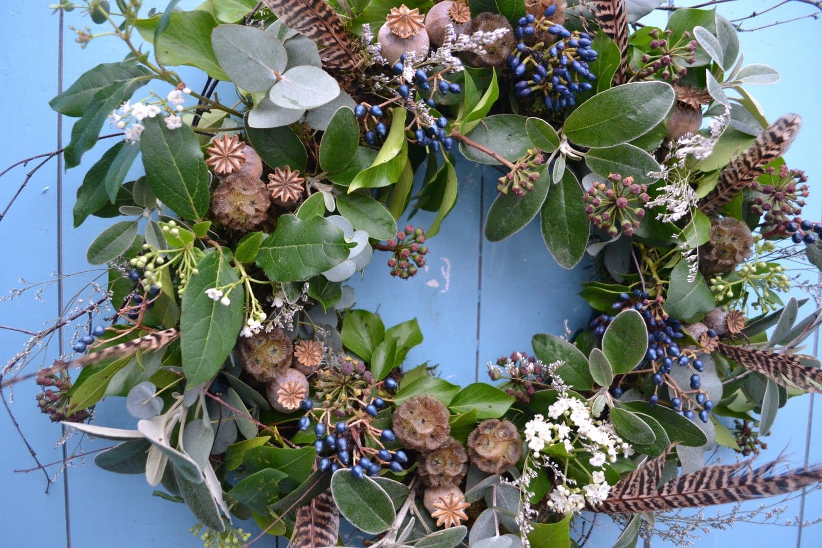 A handmade Christmas wreath made from British, seasonal foliage