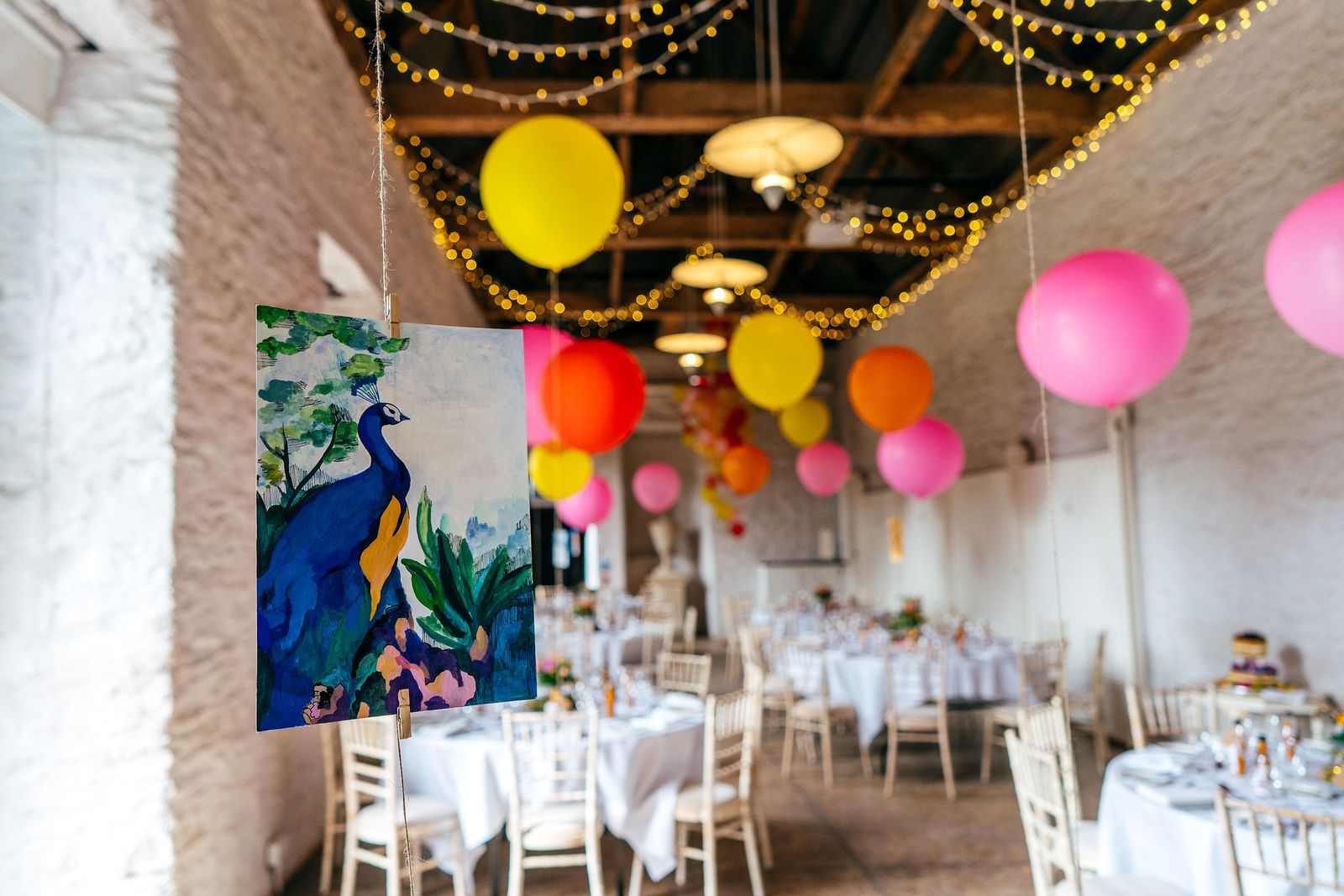 Balloons fill the reception space at this country house wedding in Somerset